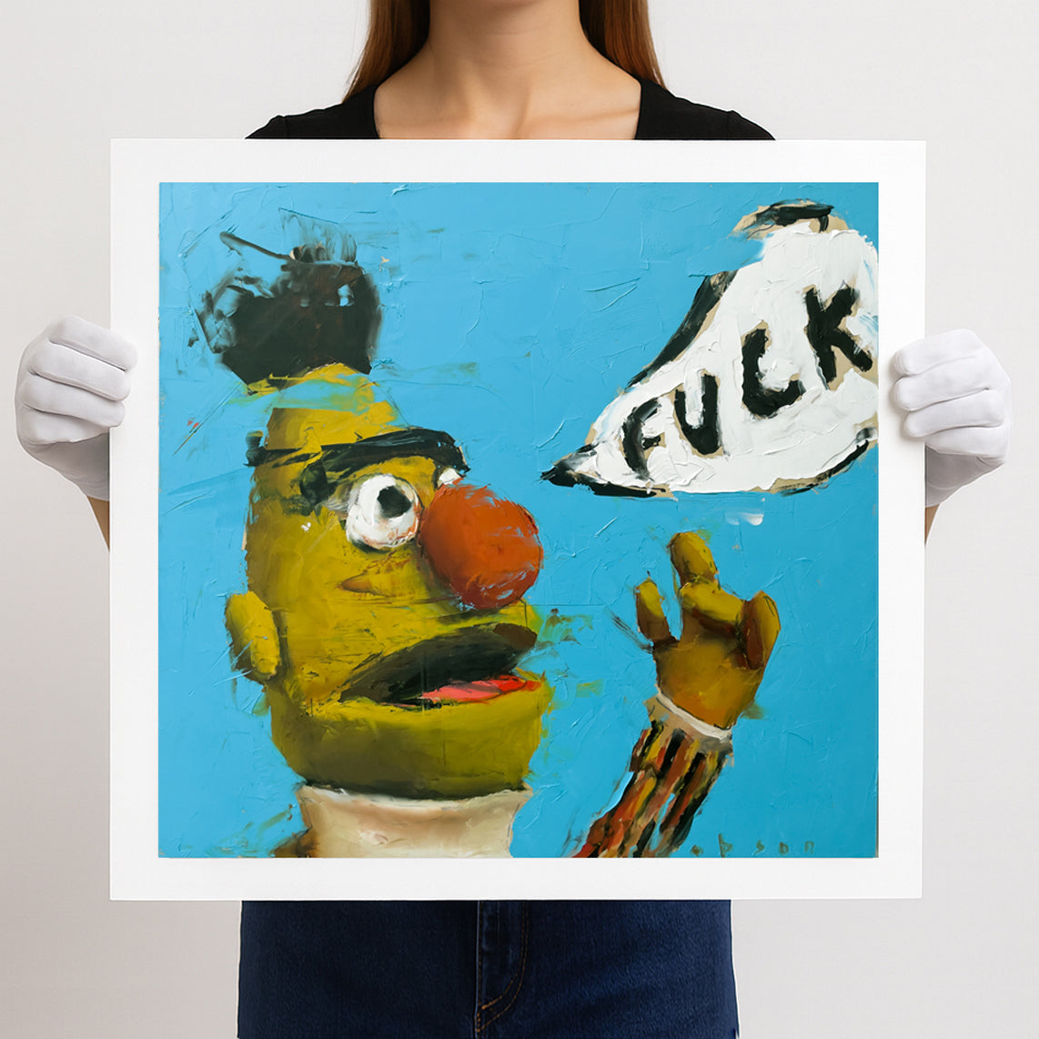 A person wearing white gloves holds up a giclée art print of Bert’s Rant (2021) by contemporary painter and muralist Robson. The painting depicts Bert from Sesame Street shouting in a speech bubble against a vivid blue background, rendered in thick impasto oil textures.
